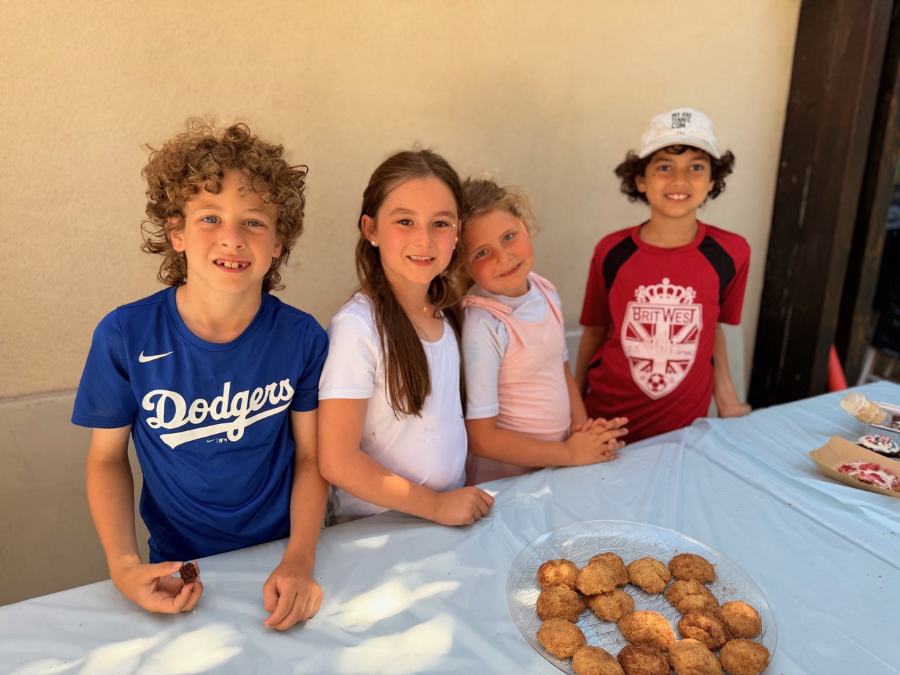 Academy students celebrating together at a community event